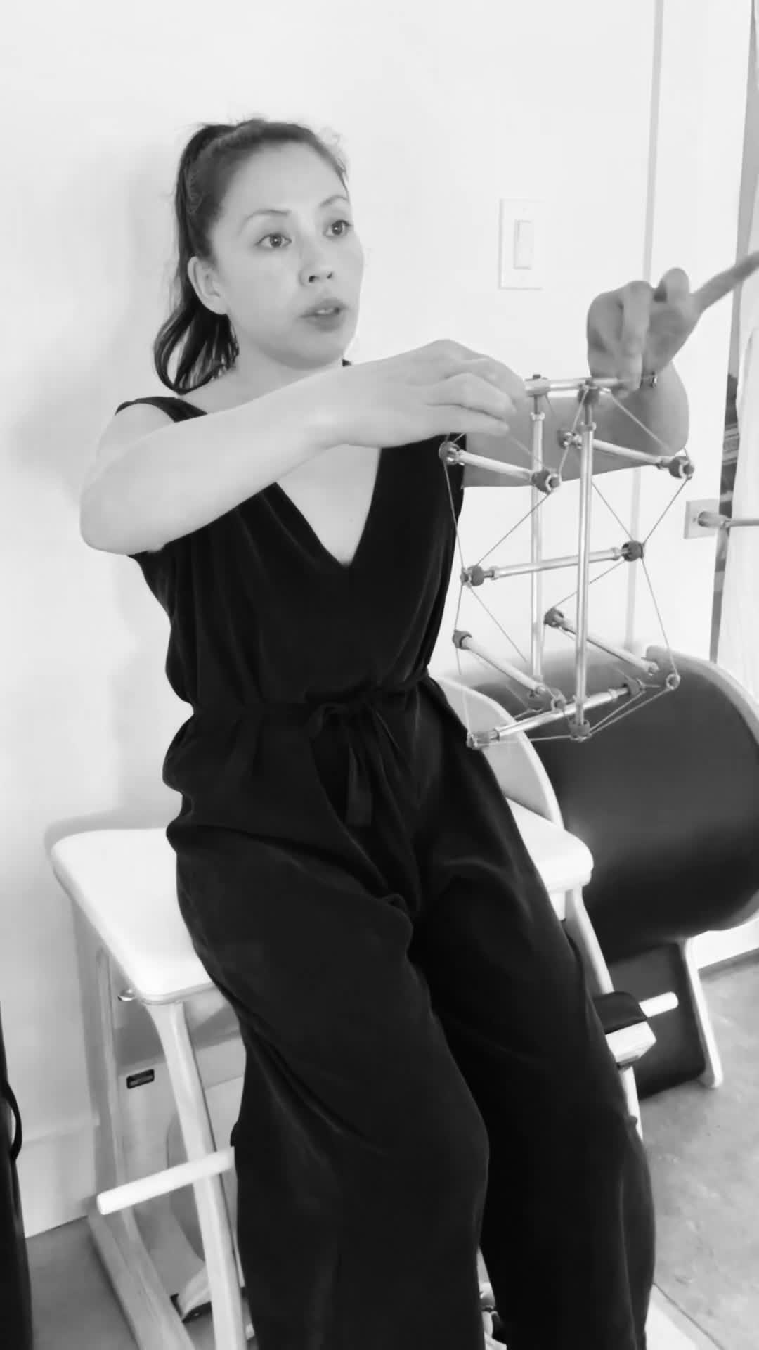 Kaita demonstrating fascial structure with a tensegrity model