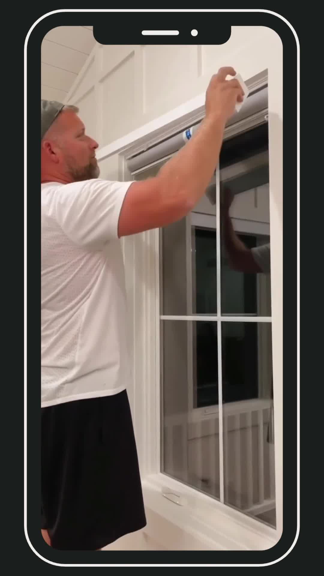 Blinds Insider installer demonstrating a window shade